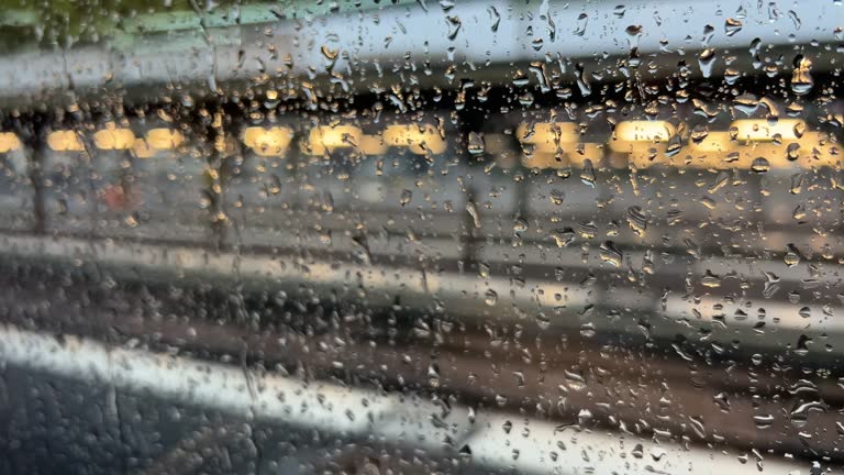 train departing from station with rainy windows in Paris