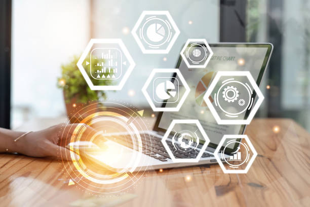 istock businesswoman hand working with laptop computer in modern office with virtual icon diagram 1495307043