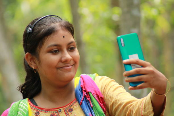 istock Indian Young Girl taking selfie. 1495310251