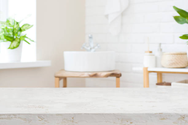 istock Handmade table top for product display in blur bathroom interior 1495311783