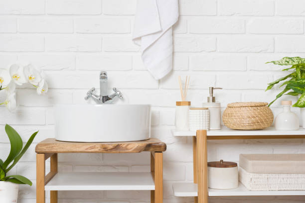 istock Stylish bathroom interior with round vessel sink and various accessories 1495311883