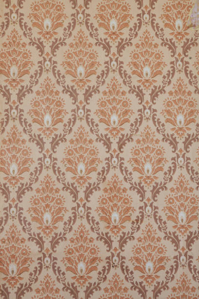 istock Old wallpaper on the wall. Old wallpaper for texture or background. 1495312202