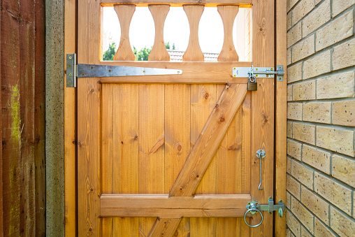 Padlock on an old wooden door