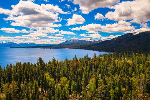 View of Lake Tahoe from the Eagle Rock in California, with Sierra Nevada Mountains in the background.