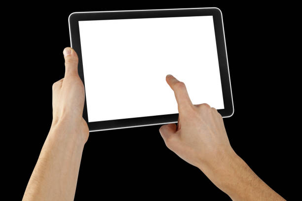 istock a tablet in a hand on the  black backgrounds 1495321049