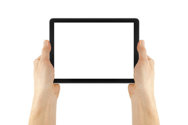 istock a tablet in a hand on the  white backgrounds 1495321125