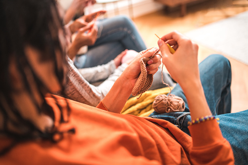 Quality Family Time: Knitting and Crocheting Joy in Retro Living Room