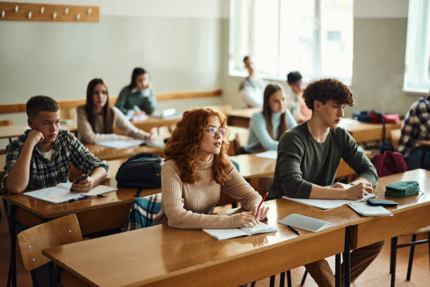 istock Large group of students on a class at high school. 1495321297