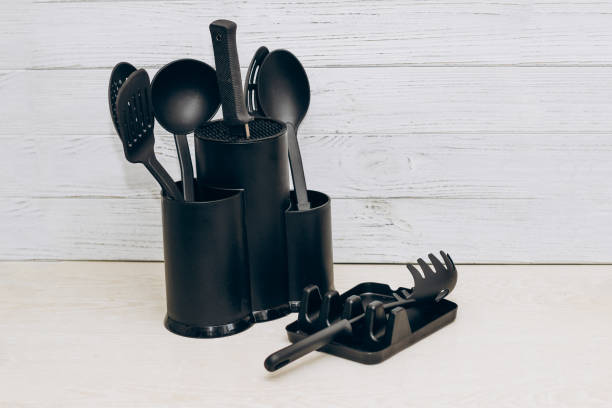 istock Kitchen tools plastic for multicooker on a wooden table in a dish organizer 1495327321