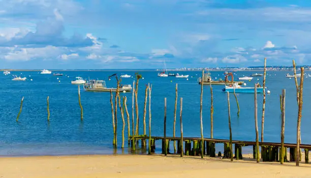 Photo of Arcachon bassin with fishing boat in atlantic ocean- France, Nouvelle aquitaine