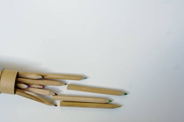 istock wooden color pencils on a light gray background. Selective focus 1495330398