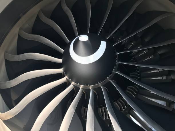 istock Commercial airplane engine with large turbine blades and wheels 1495334191