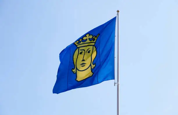 Stockholm, Sweden - May 24, 2023: flag depicting Stockholm's city coat of arms
