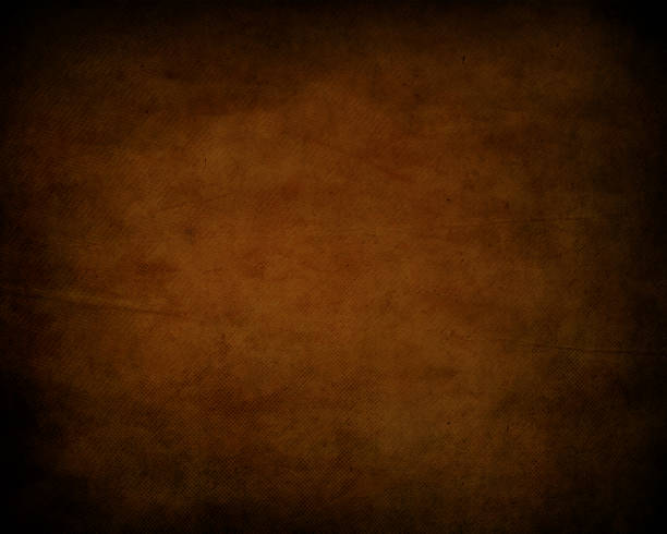 istock Grunge style old sepia toned paper background 1495342704