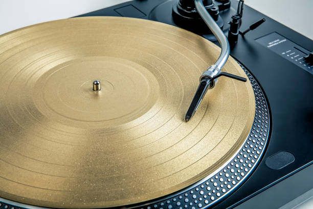 istock Turntable playing vinyl record close up. Retro audio equipment. 1495353775