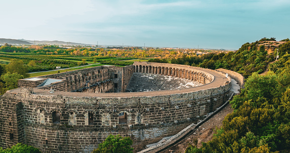 The theatre in Aspendos is considered to be the best-preserved theatre of antiquity. The Roman builders of this structure managed to express the state of ideal balance between the auditorium and the skene building and, what's more, the whole theatre matches perfectly into the landscape.