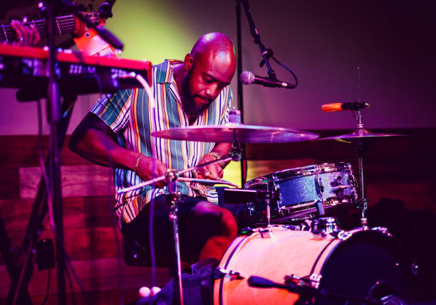 istock Drummer musician performing on stage 1495356633