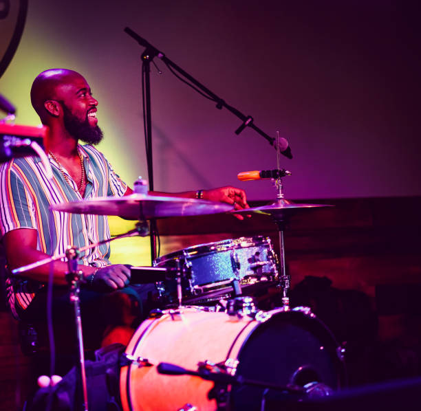 istock Drummer musician performing on stage 1495356734