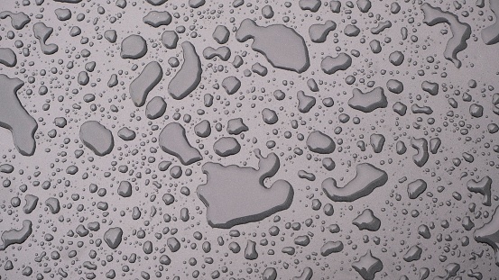 A closeup of raindrops on glass
