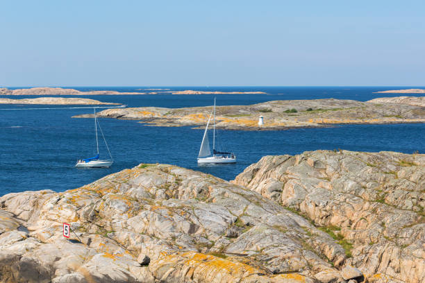 istock Sailing boats in rocky sea archipelago 1495359437