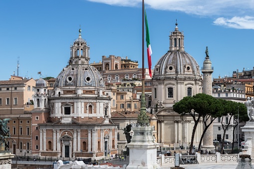 A scenic view of domes of old buildings in Piazza Venezia, Rome, Italy