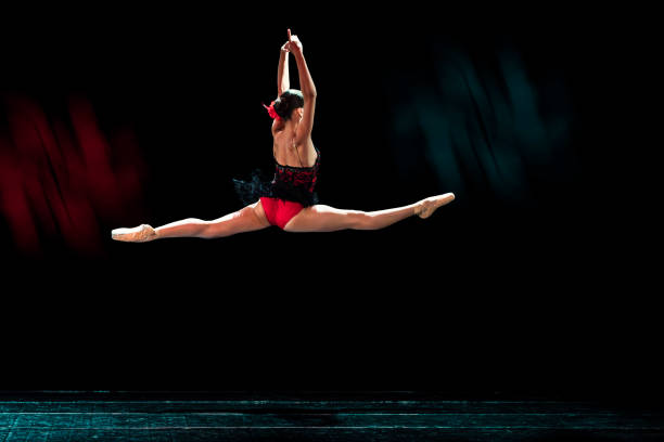 istock Young girl dancing freestyle ballet in Tango choreography 1495361370