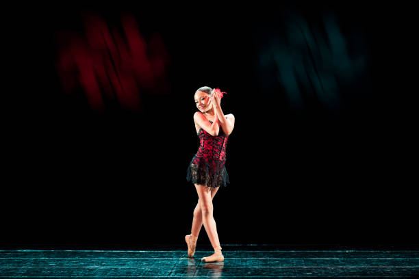istock Young girl dancing freestyle ballet in Tango choreography 1495361413