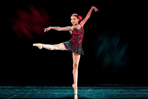 Young girl dancing freestyle ballet in Tango choreography