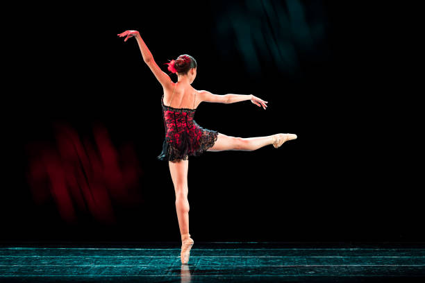 istock Young girl dancing freestyle ballet in Tango choreography 1495361481