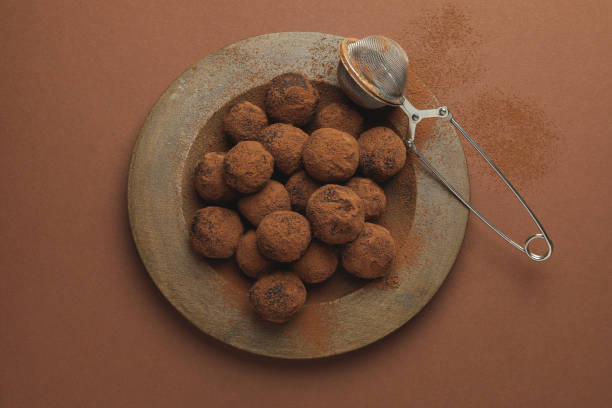 istock Concept of sweets with truffles on brown background 1495362808