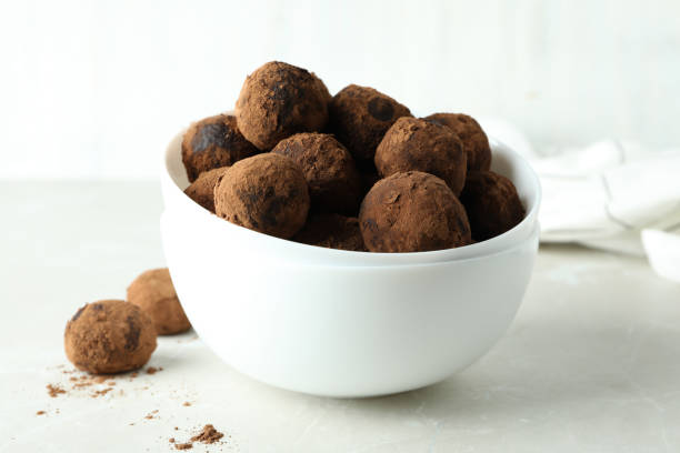 istock Concept of sweets with truffles on white background 1495362896