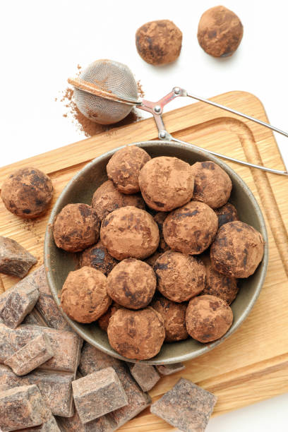 istock Concept of sweets with truffles on white background 1495363167