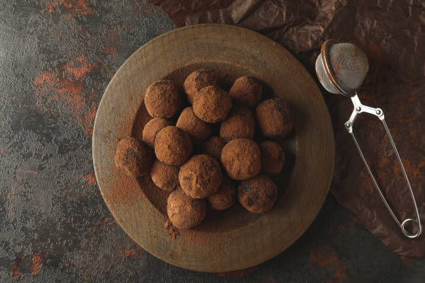 istock Concept of sweets with truffles on dark textured background 1495363276