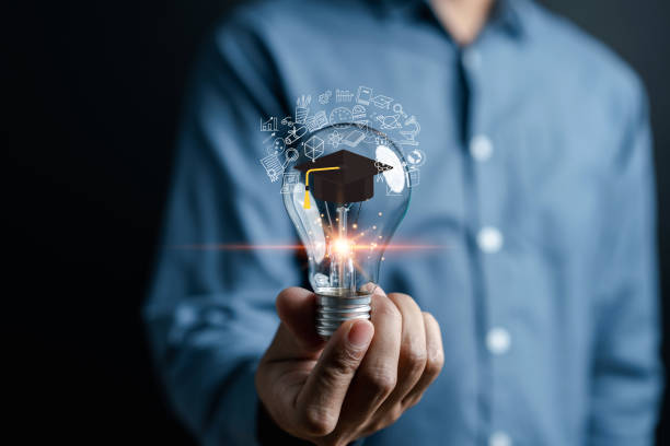 istock Businessman hand holding light bulb working Creativity, Creative for new idea and innovation with energy and power, growth and success development. 1495364145