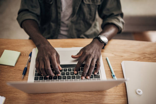 istock Man working on laptop at home 1495365029