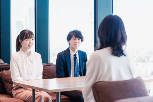 istock Businessperson chatting in a clean office 1495366544