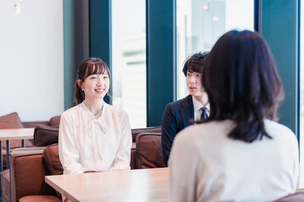 istock Businessperson chatting in a clean office 1495366565