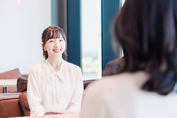 istock Businessperson chatting in a clean office 1495366568