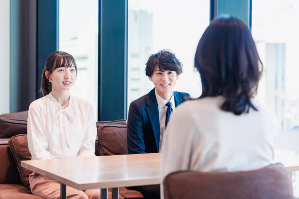 istock Businessperson chatting in a clean office 1495366572