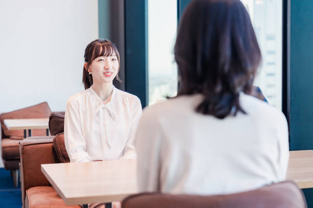 istock Businessperson chatting in a clean office 1495366576