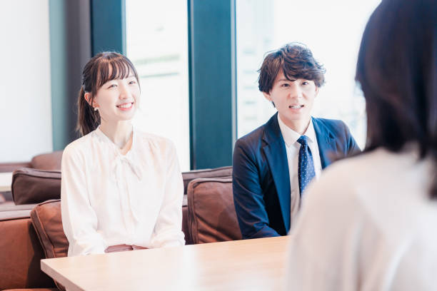 istock Businessperson chatting in a clean office 1495366581