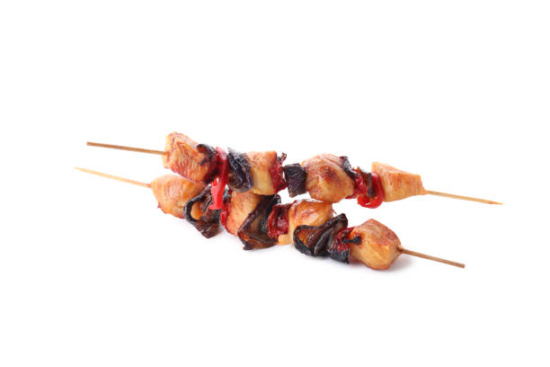 istock Tasty chicken shashlik isolated on white background 1495366862
