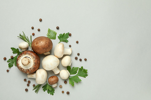 Concept of tasty food with champignon on light