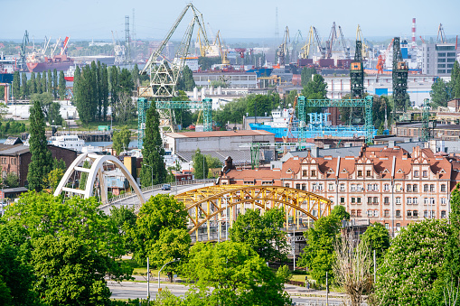 Gdansk Industrial Area: Panoramic View from Gradowa Hill with Stocznia Gdańska Shipping Yard, Cranes, and Bridges.