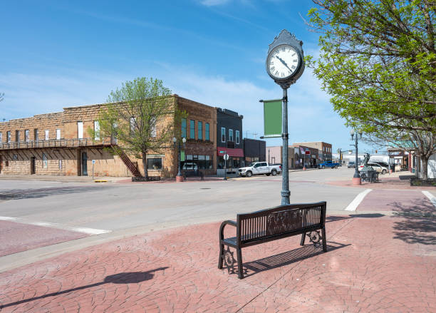istock Clock and Bench on State Street in Belle Fourche 1495378455