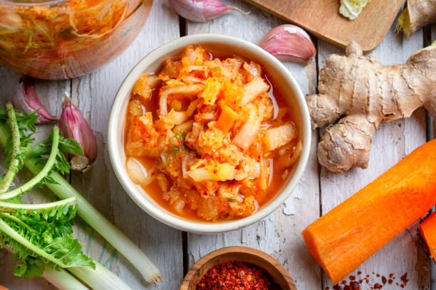 Homemade kimchee and glass jar Homemade kimchee and glass jar Kimchi stock pictures, royalty-free photos & images