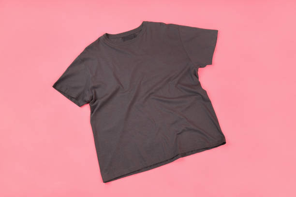 istock Dark t-shirt with space for print on pink background 1495381859