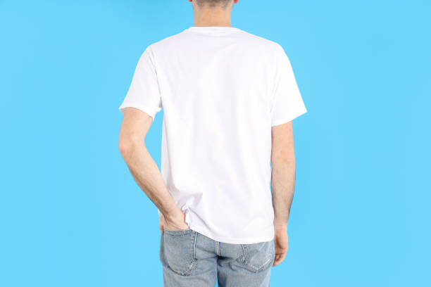 istock Man in blank white t-shirt on blue background 1495385020