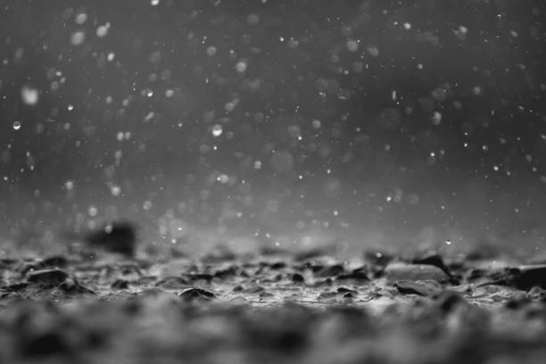 rain was falling on the roadway due to precipitation that was forming after depression hit Thailand causing heavy rain in some areas and flooding road surface. Behind the scenes of heavy rain
