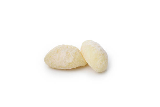 istock Raw potato gnocchi isolated on white background 1495389395